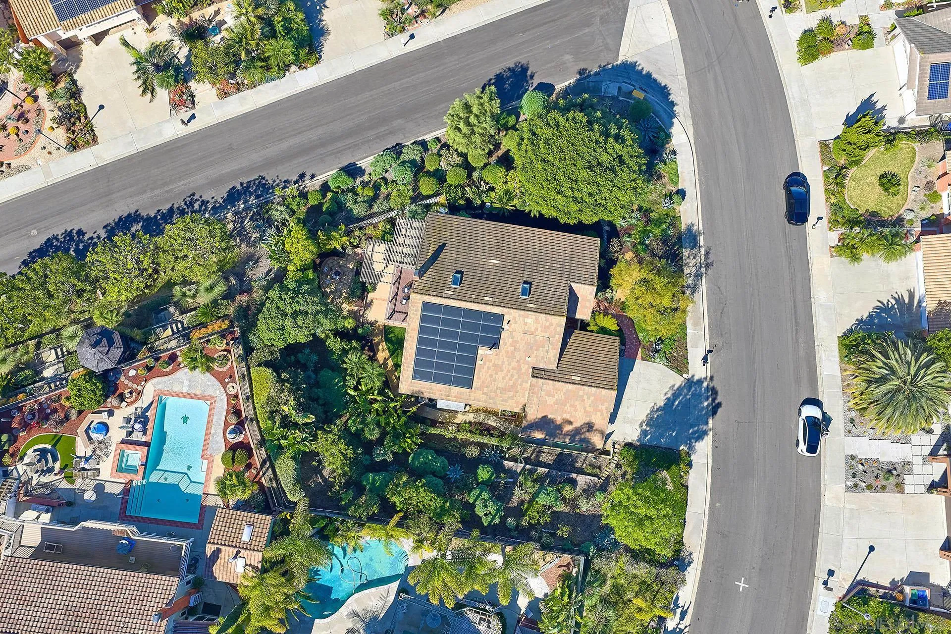 7627 Reposado Drive Carlsbad, CA 92009 - Photo 43 of 54 an aerial view of a house with a garden