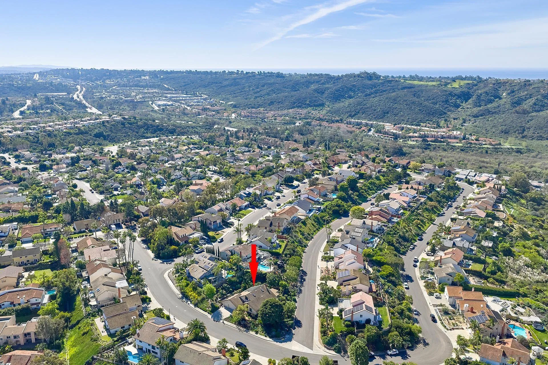 7627 Reposado Drive Carlsbad, CA 92009 - Photo 48 of 54 an aerial view of house with yard and mountain view in back