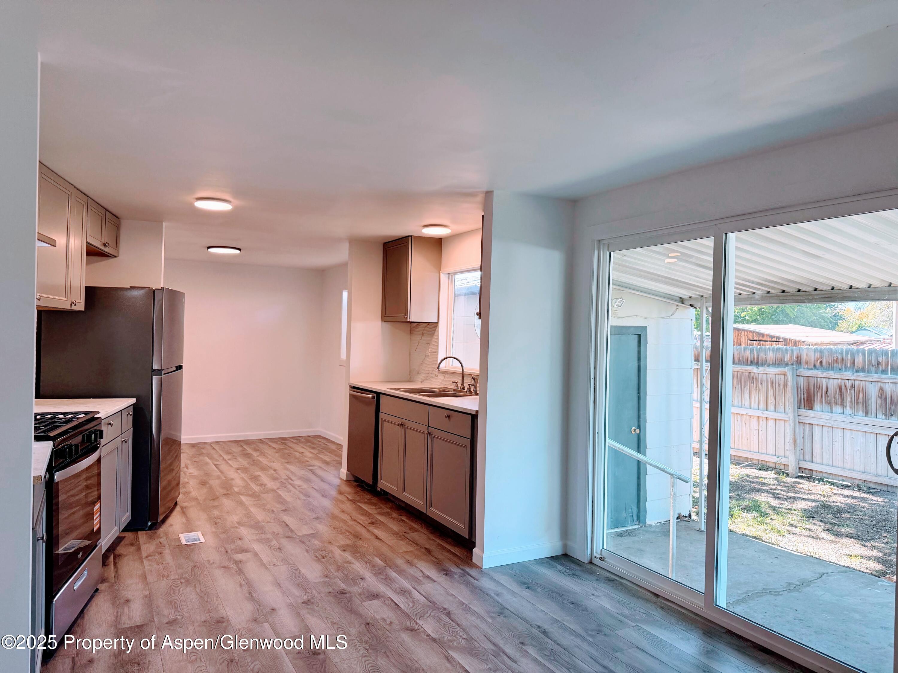 2955 Cedar Place Grand Junction, CO 81504 - Photo 6 of 17 Kitchen w Slider