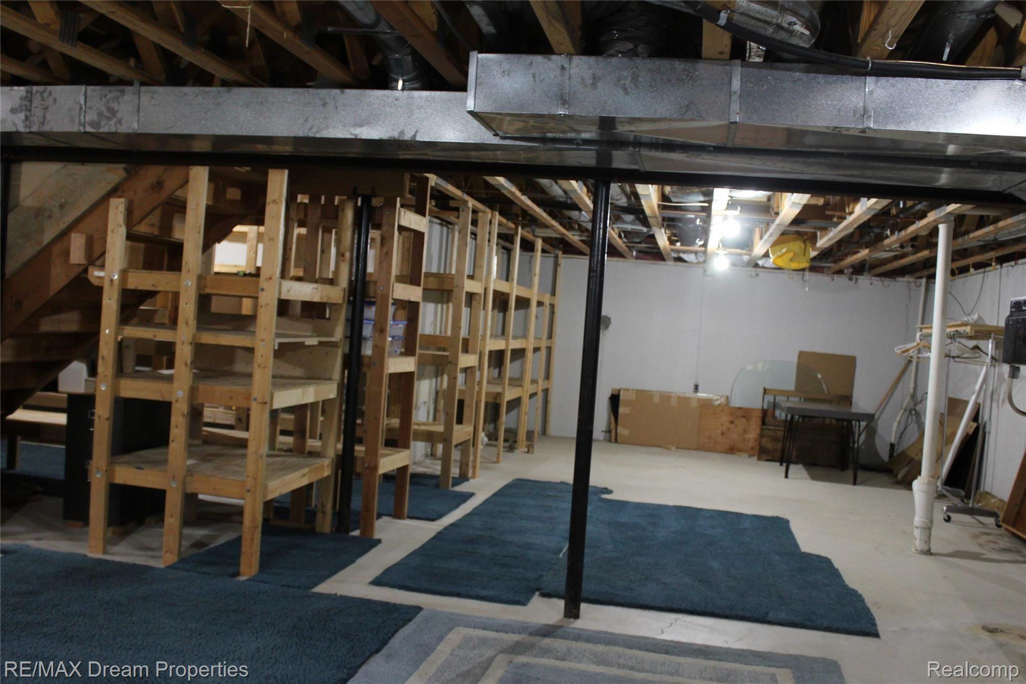 21975 River Ridge Trail Farmington, MI 48335 - Photo 20 of 22 basement and storage shelving units.jpg