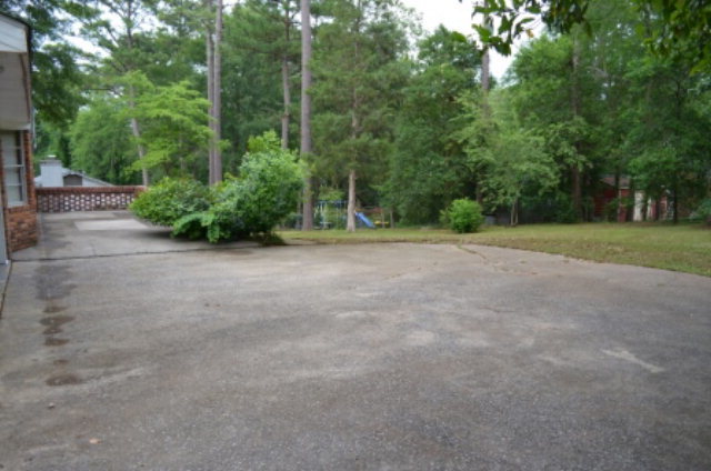 1847 Wood Valley Road Macon, GA 31211 - Photo 20 of 23 a view of a field with trees in the background