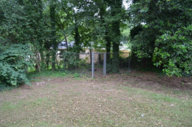 1847 Wood Valley Road Macon, GA 31211 - Photo 21 of 23 a view of a forest with trees in the background