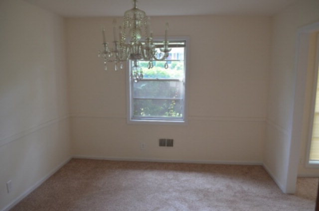 1847 Wood Valley Road Macon, GA 31211 - Photo 5 of 23 a view of room with window and chandelier