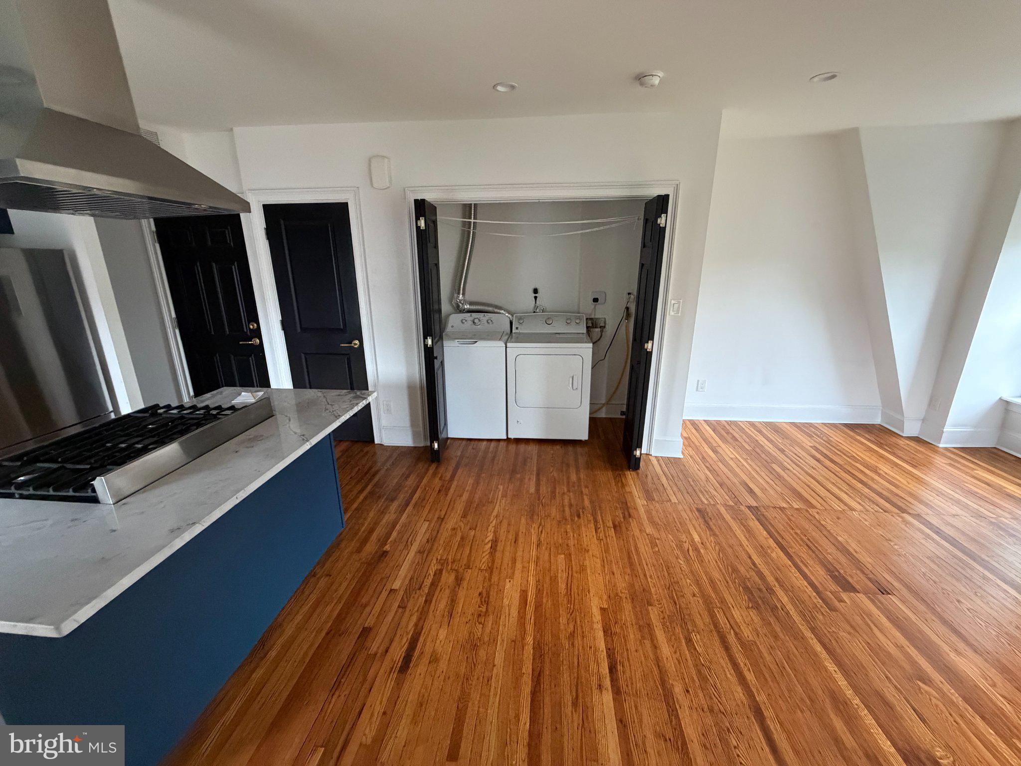 815 South 49th Street Philadelphia, PA 19143 - Photo 41 of 72 Modern kitchen with warm wood floors.