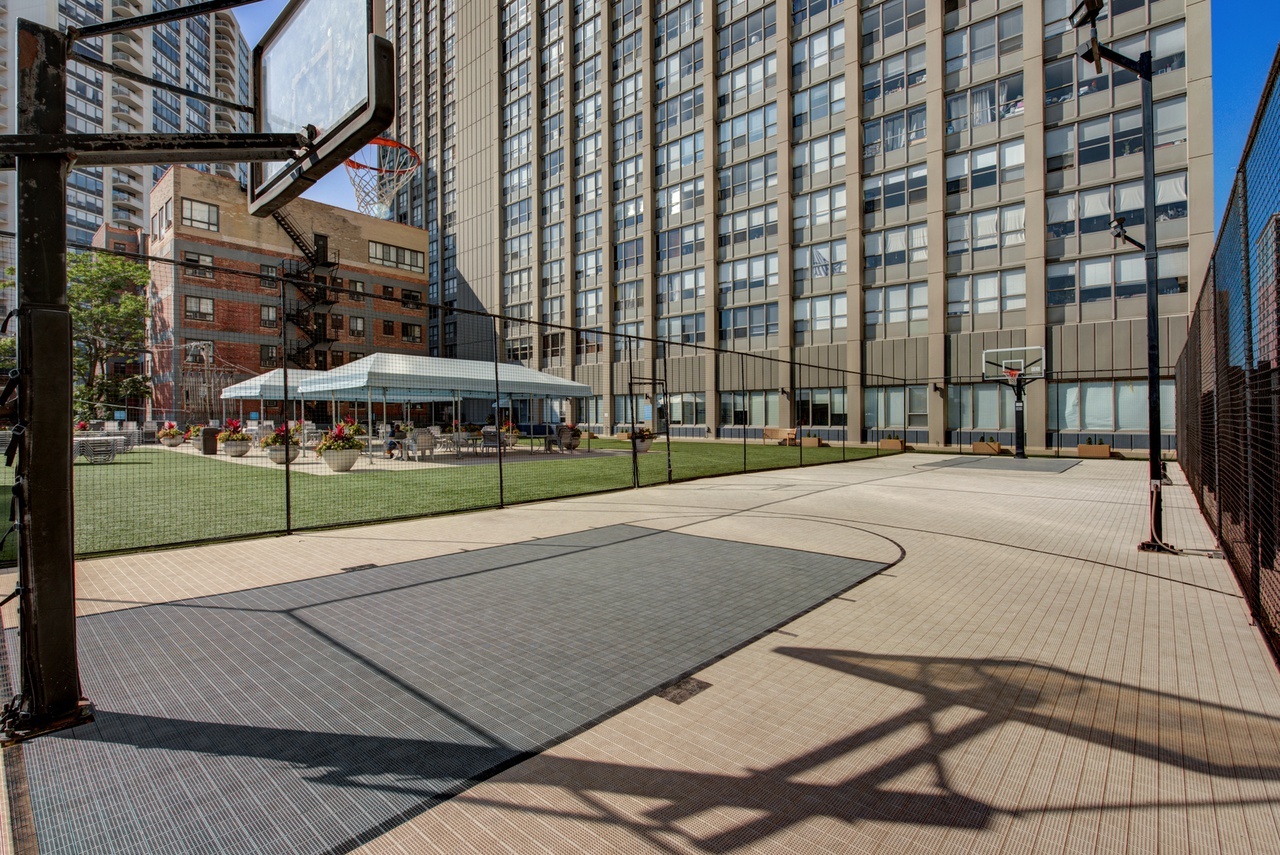 655 West Irving Park Road, Unit 1903 Chicago, IL 60613 - Photo 18 of 22 a view of a building with a pathway