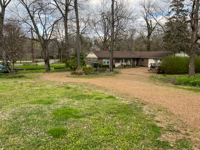 2876 Sugar Tree Road Nashville, TN 37215 - Photo 3 of 7 a view of a house with a yard