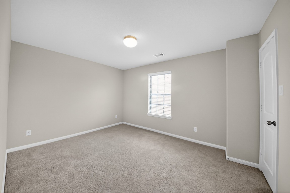2518 Cold River Drive Humble, TX 77396 - Photo 14 of 35 a view of an empty room with a window