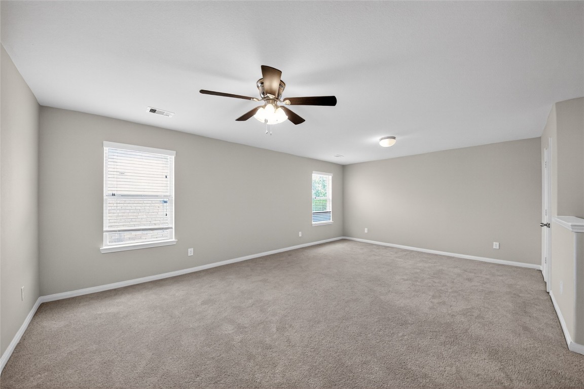 2518 Cold River Drive Humble, TX 77396 - Photo 23 of 35 a view of an empty room with a window