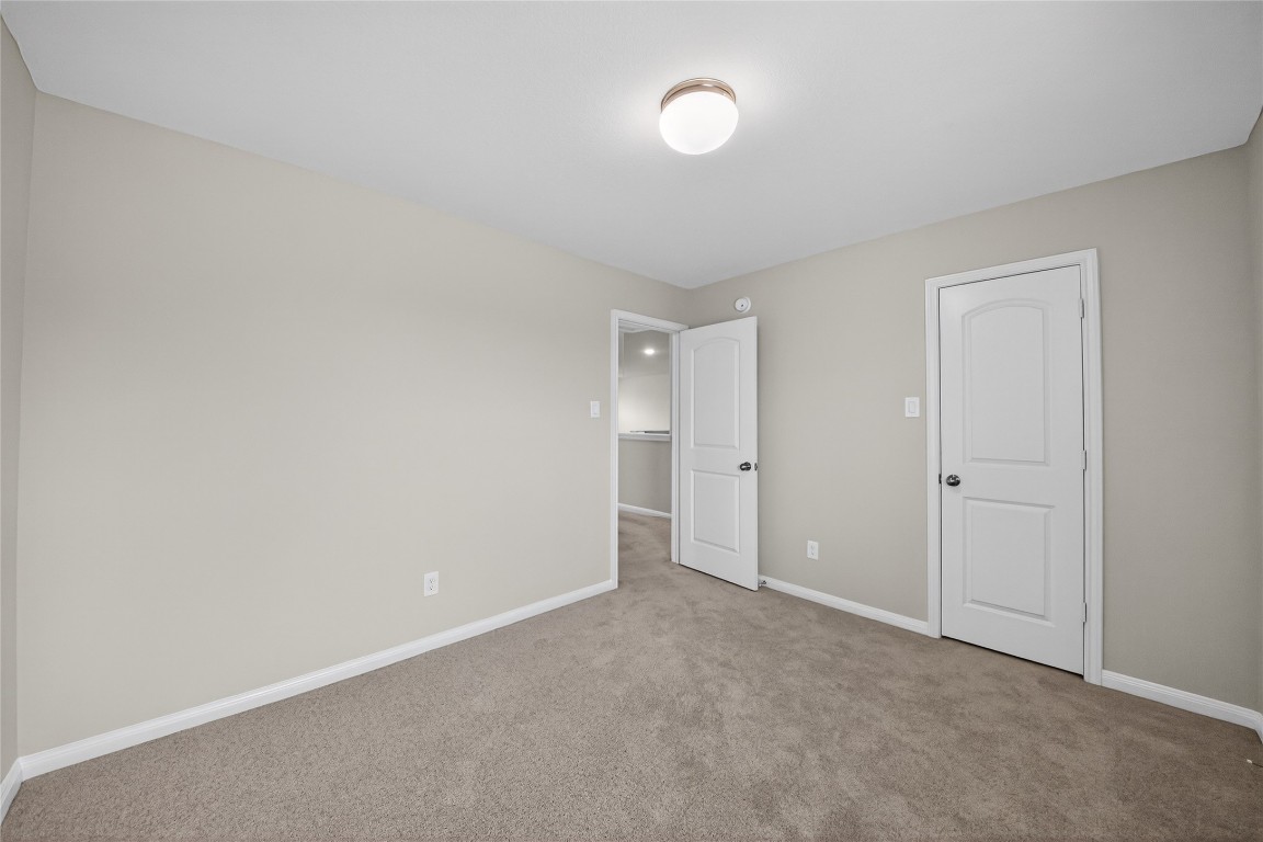 2518 Cold River Drive Humble, TX 77396 - Photo 29 of 35 a view of an empty room and a window
