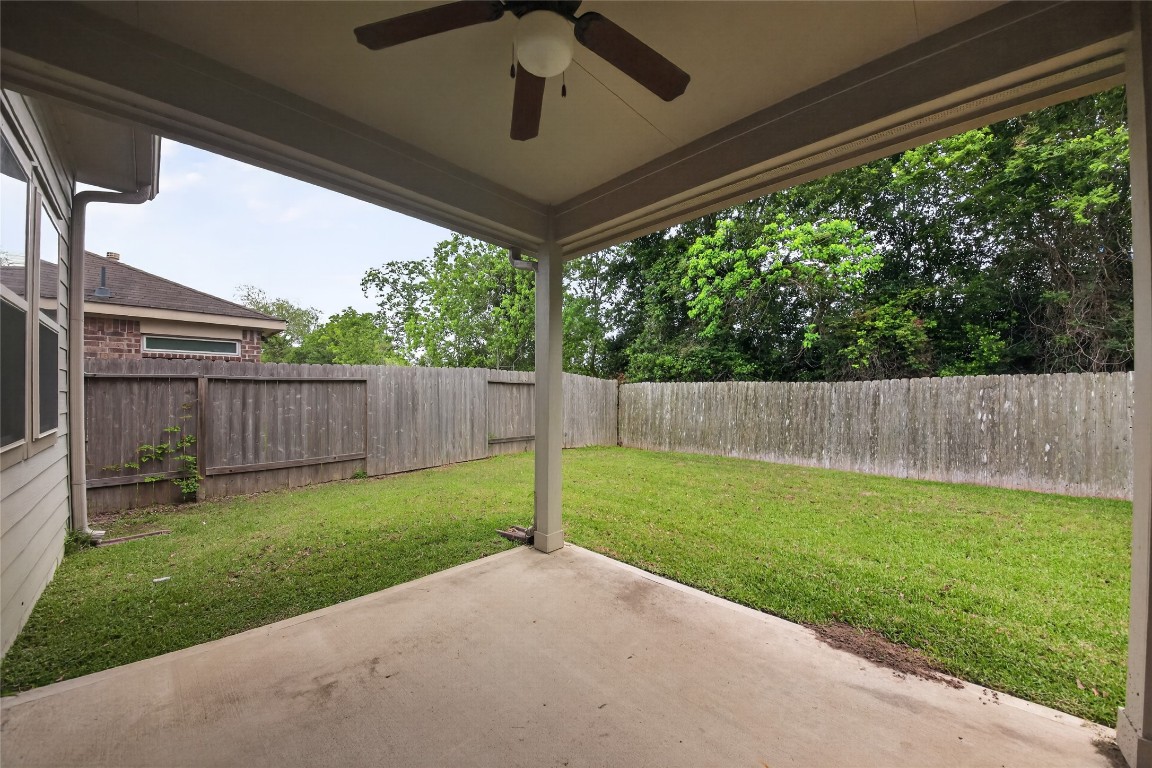 2518 Cold River Drive Humble, TX 77396 - Photo 9 of 35 a view of a backyard with a swing
