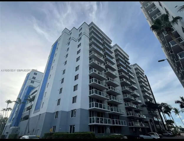 a view of a patio with couches and a fire pit