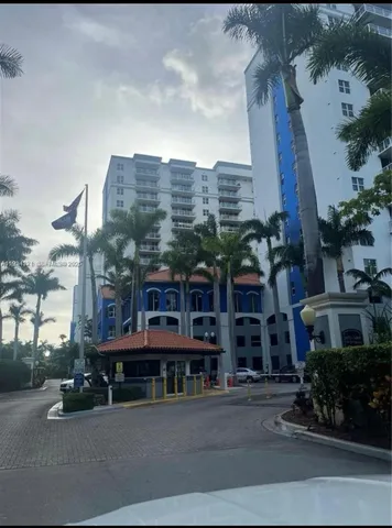 a view of balcony with wooden floor and lake view
