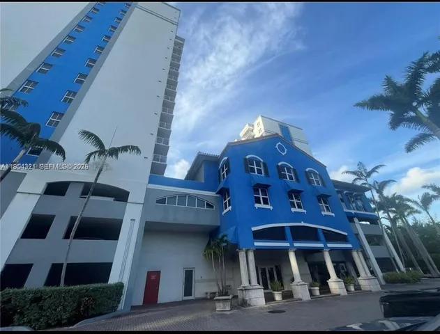 a view of a lake with a house