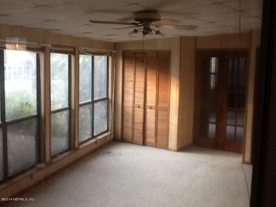 6542 Colgate Road Jacksonville, FL 32217 - Photo 5 of 9 a view of an empty room with a window