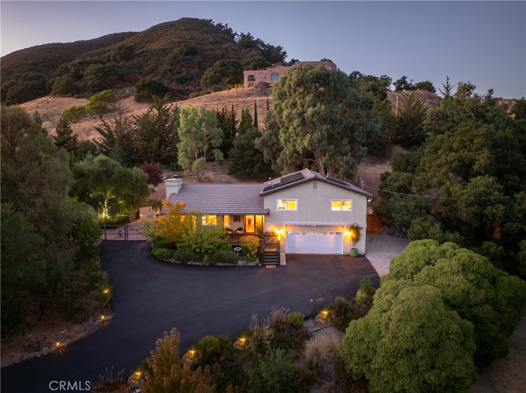 13875 Los Altos Road Atascadero, CA 93422 - Photo 1 of 1 an aerial view of a house with a garden