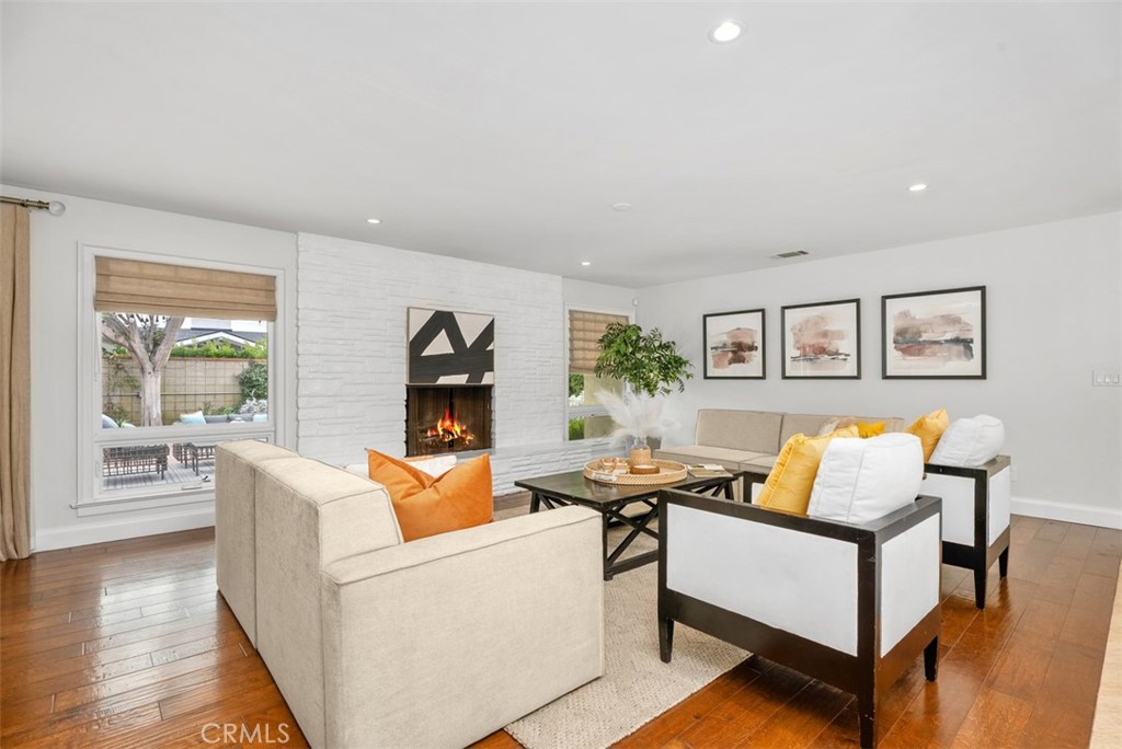 1015 Nottingham Road Newport Beach, CA 92660 - Photo 8 of 34 a living room with furniture and wooden floor