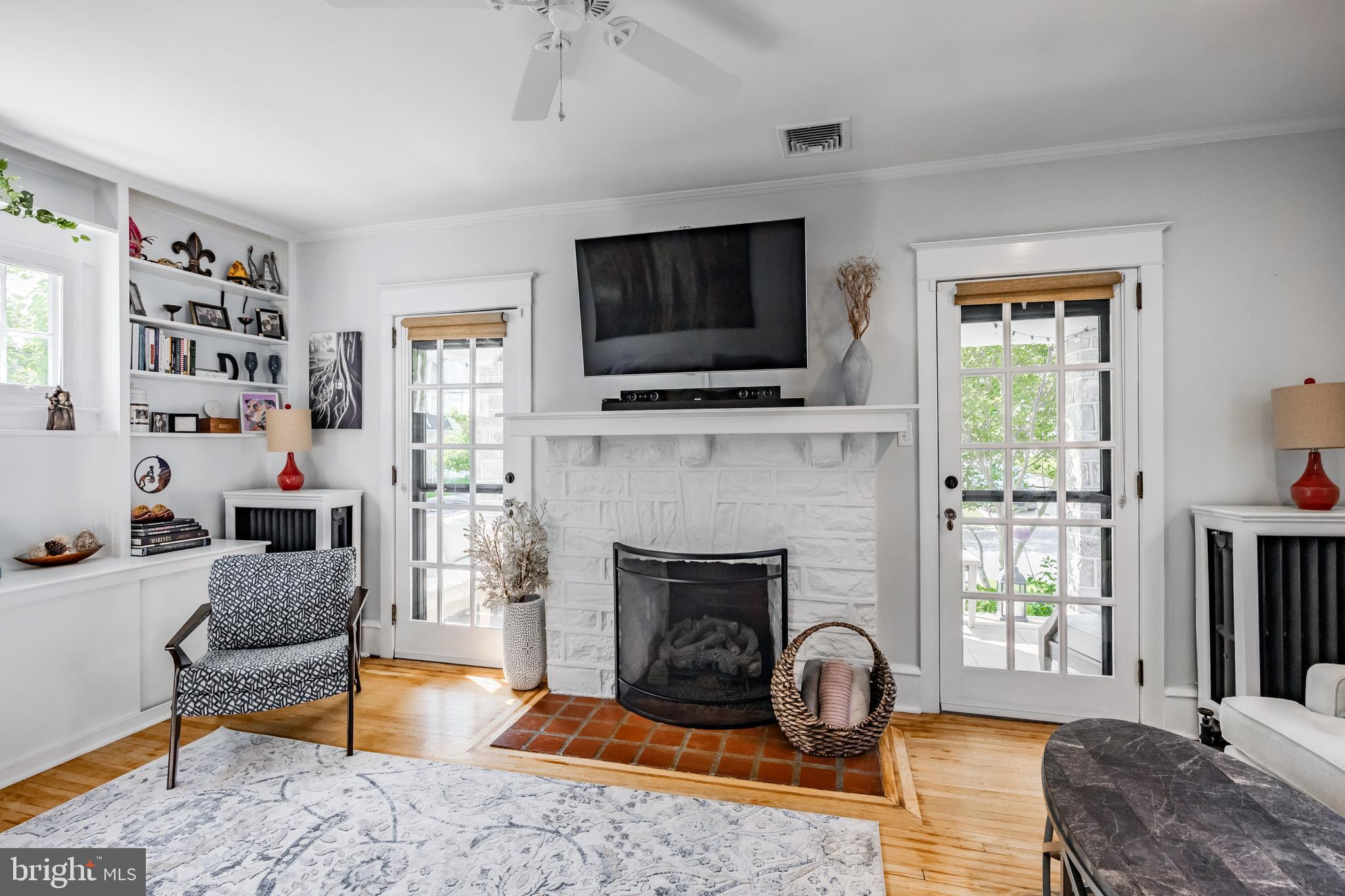 536 Kathmere Road Havertown, PA 19083 - Photo 13 of 45 a living room with furniture fireplace and flat screen tv