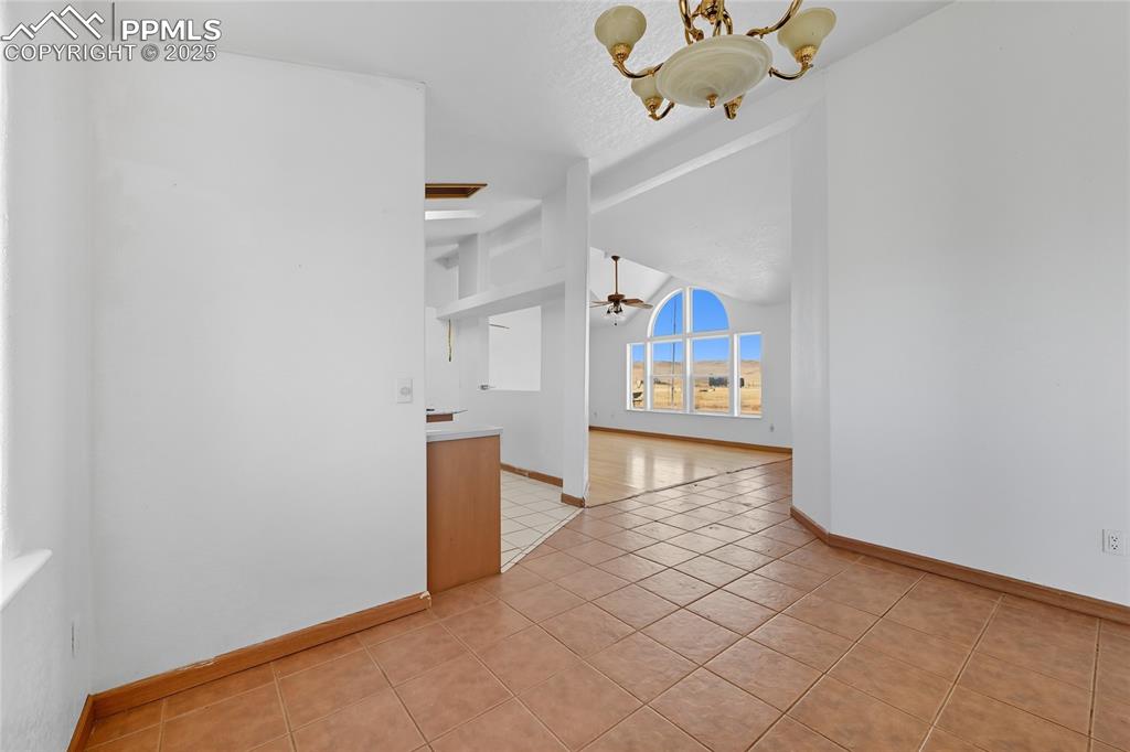 16595 Yoder Road Calhan, CO 80808 - Photo 16 of 28 a view of a hallway view with staircase
