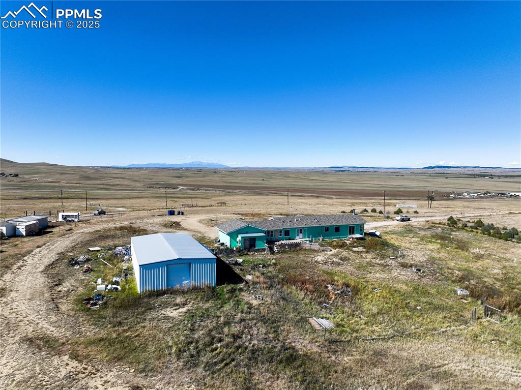 16595 Yoder Road Calhan, CO 80808 - Photo 27 of 28 a view of an ocean and beach