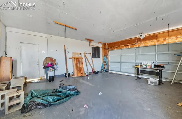 a living room with furniture a air conditioner vent and a window