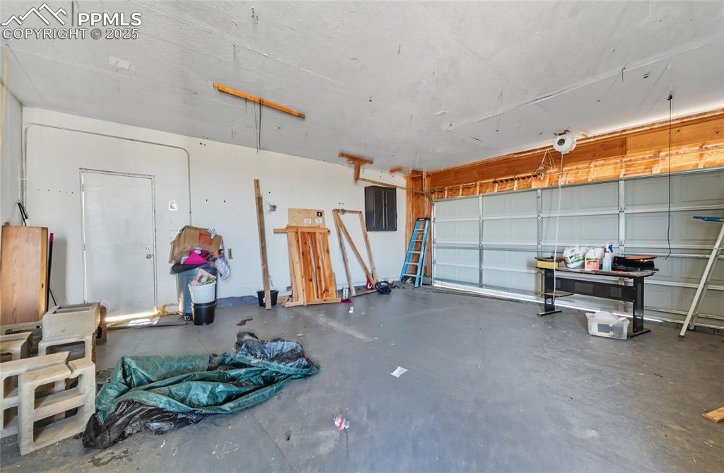 16595 Yoder Road Calhan, CO 80808 - Photo 10 of 28 a living room with furniture a air conditioner vent and a window