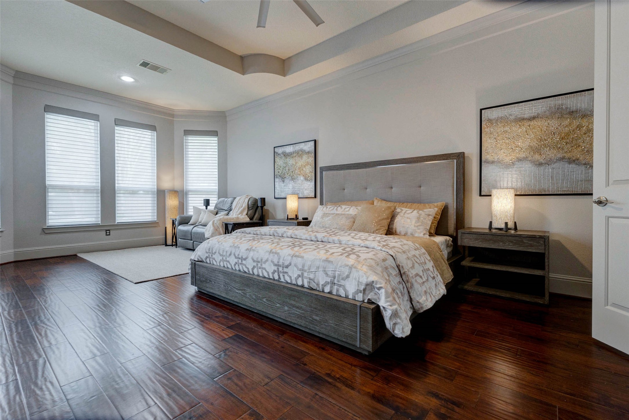 27602 Guthrie Ridge Lane Katy, TX 77494 - Photo 21 of 50 The elegant primary suite is complemented by large windows dressed with smart Hunter Douglas Nantucket shades and Silhouette room-darkening blinds, allowing for a balance of natural light by day and restful privacy when desired, all with convenient voice control.