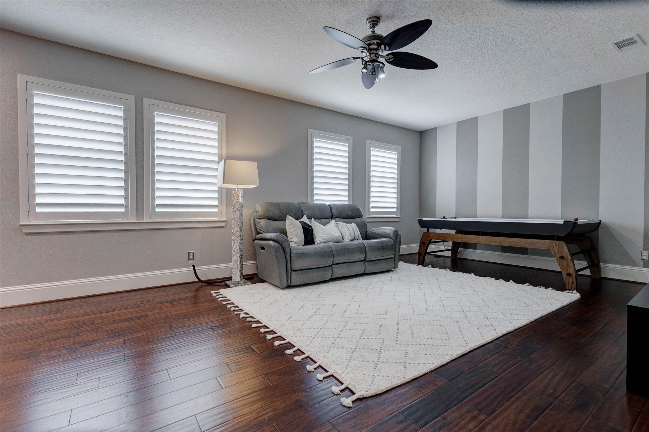 27602 Guthrie Ridge Lane Katy, TX 77494 - Photo 30 of 50 The spacious game room is filled with natural light and hardwood floors, offering plenty of room to play, relax, or host friends.