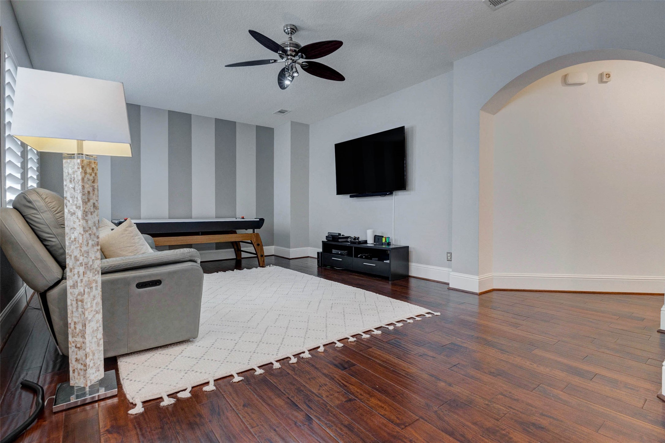 27602 Guthrie Ridge Lane Katy, TX 77494 - Photo 31 of 50 Whether it’s game night or a casual hangout, the flexible layout makes it easy to enjoy. Complete with a 75” Vizio Smart TV with Polk soundbar and subwoofer (included).