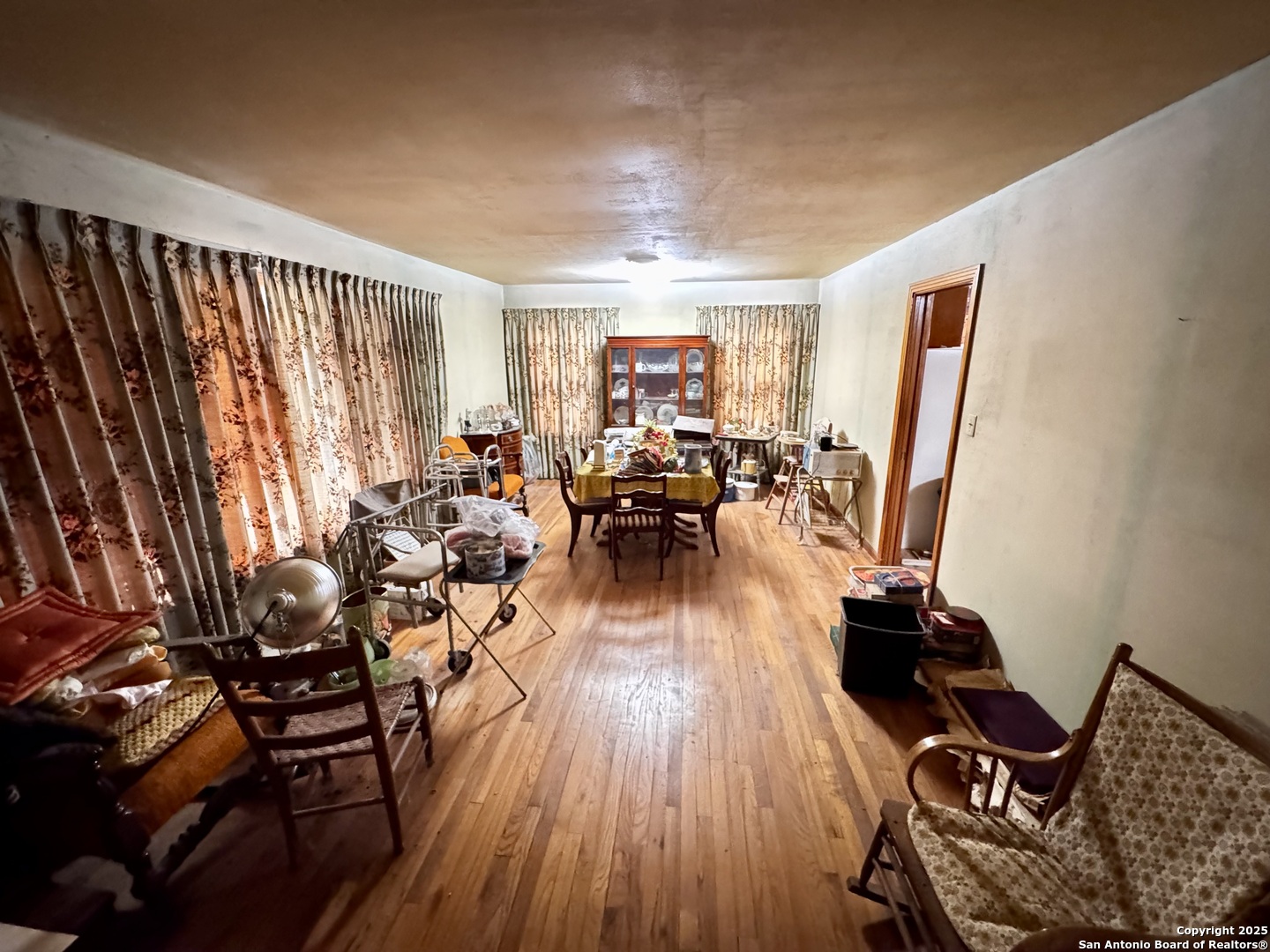 212 Patrick Pleasanton, TX 78064 - Photo 3 of 13 a living room with furniture and wooden floor