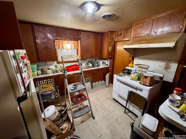 a room with furniture and a flat screen tv