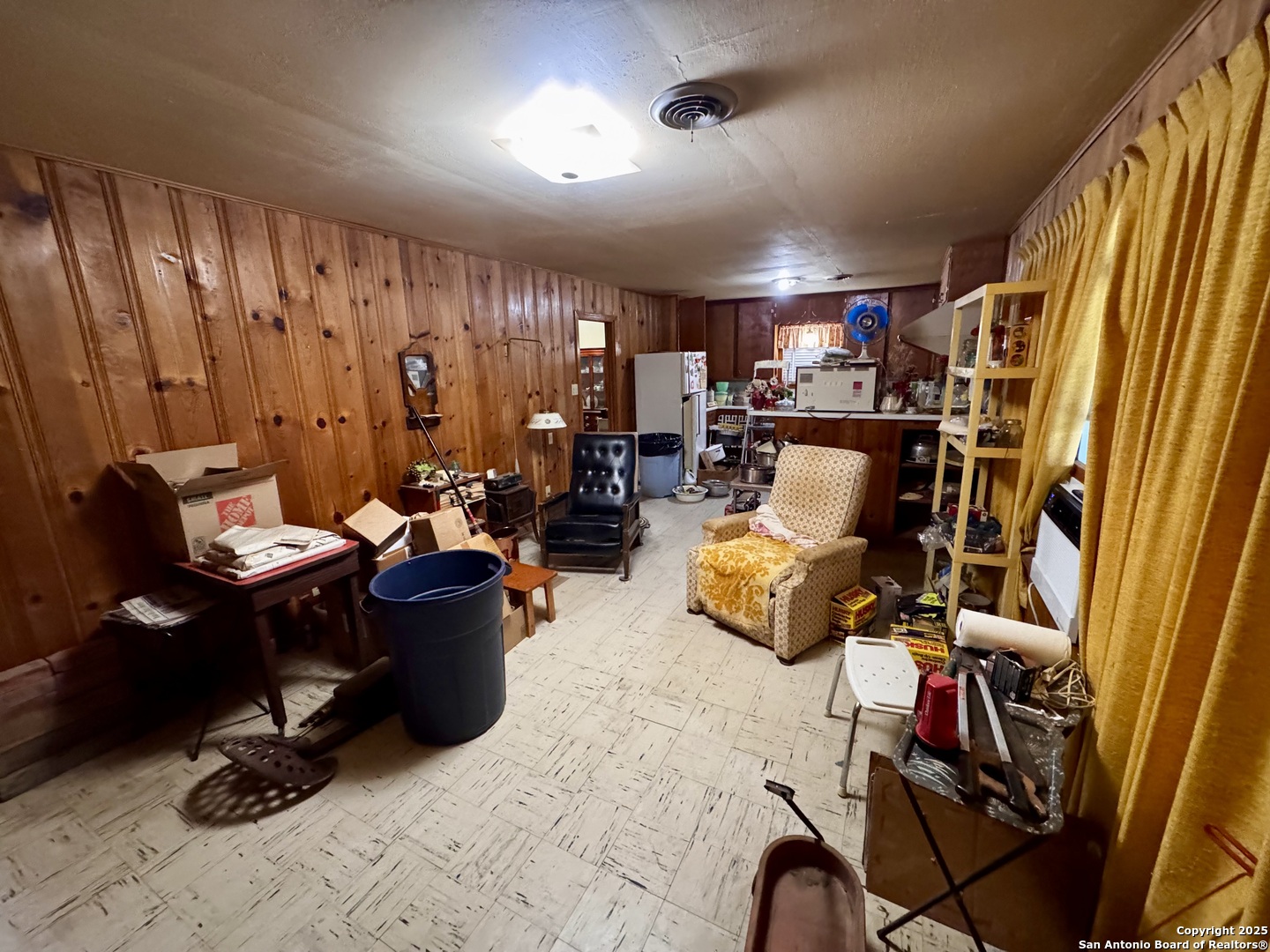 212 Patrick Pleasanton, TX 78064 - Photo 5 of 13 a view of a livingroom with workspace and a window