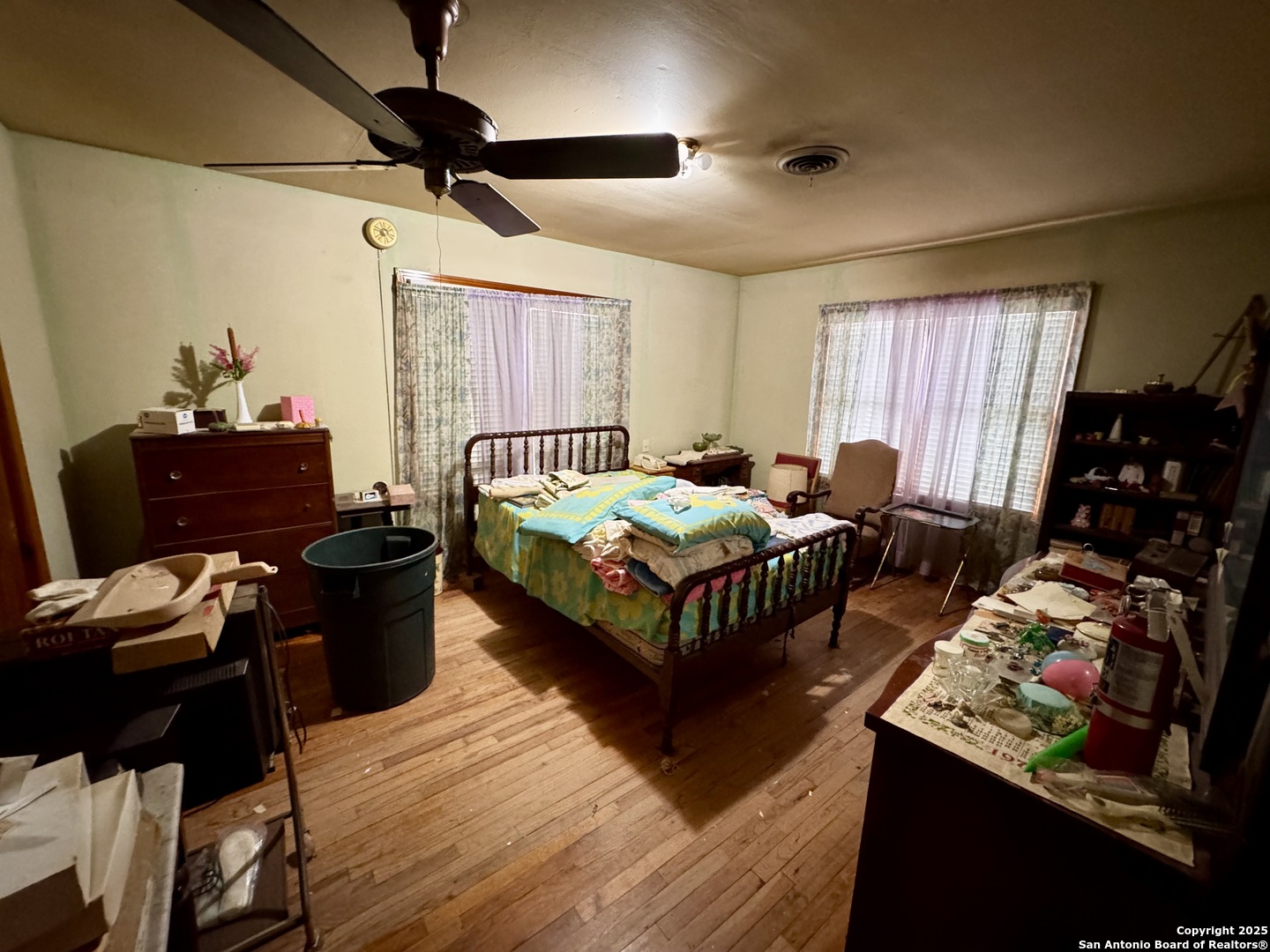 212 Patrick Pleasanton, TX 78064 - Photo 7 of 13 a bedroom with furniture and a window