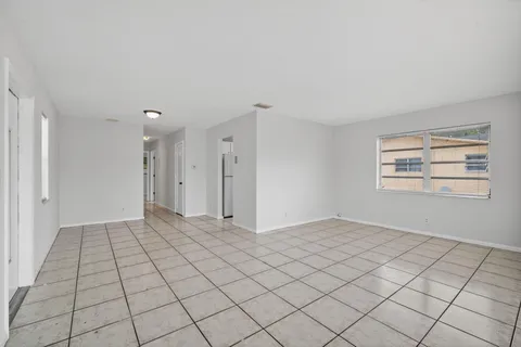 a view of an empty room and window
