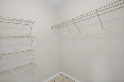 a view of a room with racks on the wall