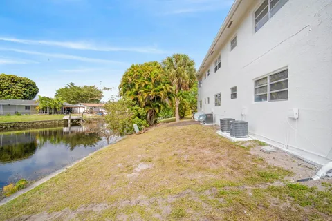 a view of a house with a lake view