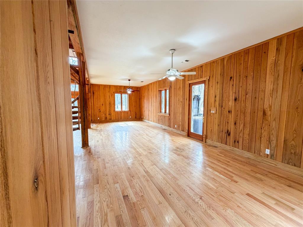 322 Wild Wood Drive Decatur, TX 76234 - Photo 11 of 39 a view of a room with wooden floor