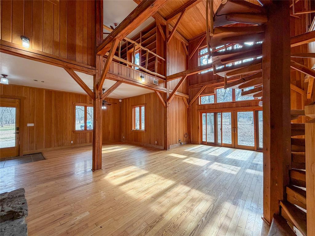 322 Wild Wood Drive Decatur, TX 76234 - Photo 12 of 39 a view of an entryway with wooden floor
