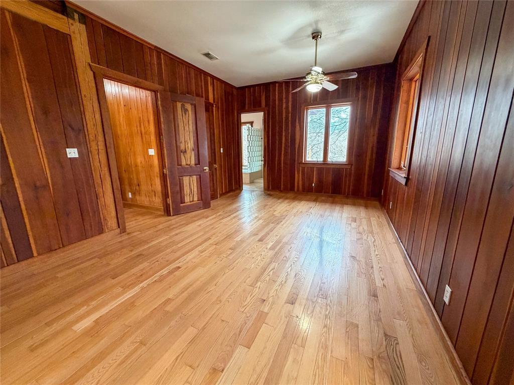 322 Wild Wood Drive Decatur, TX 76234 - Photo 22 of 39 a view of an entryway with wooden floor and door