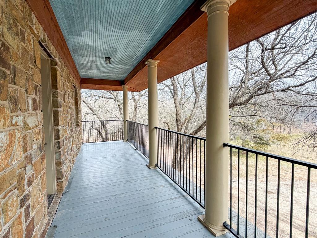 322 Wild Wood Drive Decatur, TX 76234 - Photo 29 of 39 a view of balcony with wooden floor