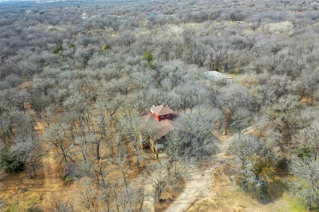 322 Wild Wood Drive Decatur, TX 76234 - Photo 32 of 39 a aerial view of a yard with large trees