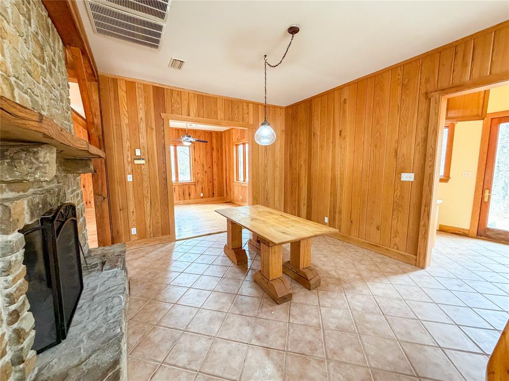 322 Wild Wood Drive Decatur, TX 76234 - Photo 7 of 39 a view of a livingroom with furniture and a fireplace