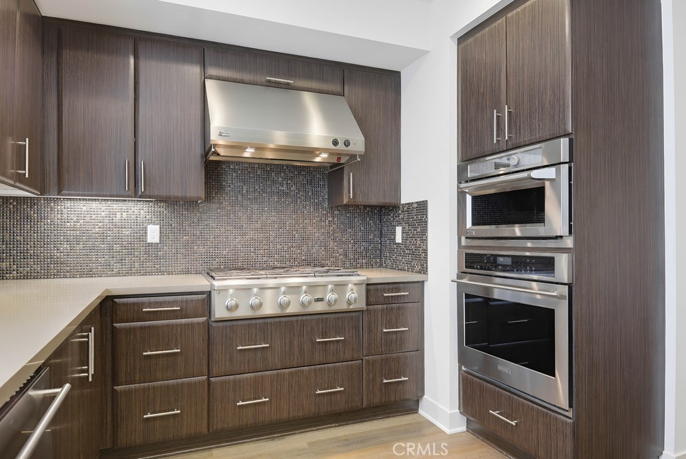 75 Lennox Irvine, CA 92612 - Photo 19 of 73 a kitchen with a stove and a microwave