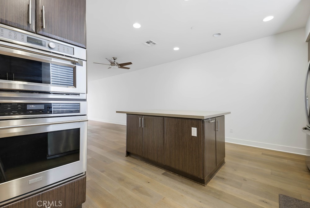 75 Lennox Irvine, CA 92612 - Photo 20 of 73 a kitchen with granite countertop cabinets and steel stainless steel appliances