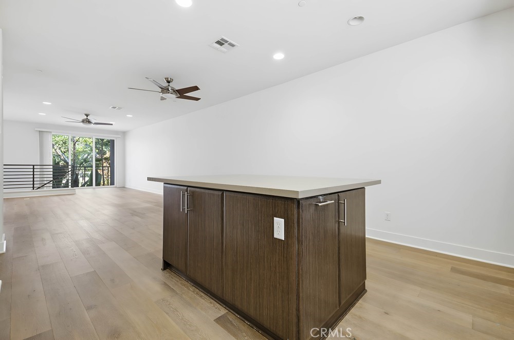 75 Lennox Irvine, CA 92612 - Photo 22 of 73 an empty room with wooden floor and windows