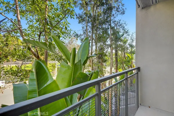 a bathroom with a double vanity sink a mirror and shower
