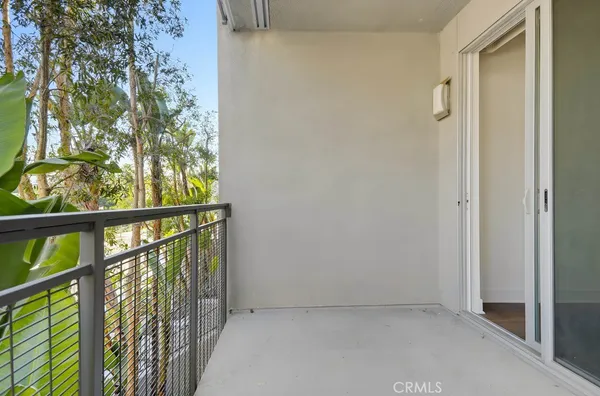 a bathroom with a shower and a sink