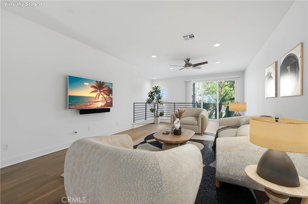 75 Lennox Irvine, CA 92612 - Photo 3 of 73 a living room with furniture and a flat screen tv