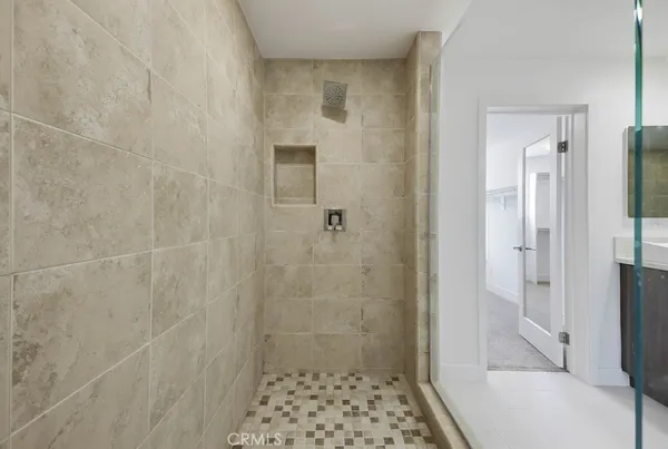 a view of a kitchen with a sink and cabinet