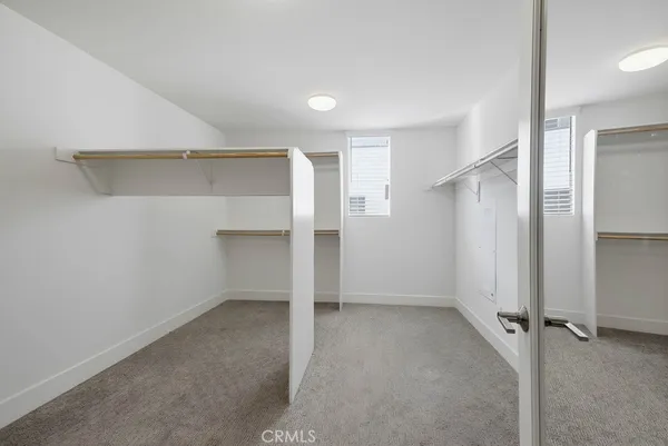 a view of small space with racks on the wall