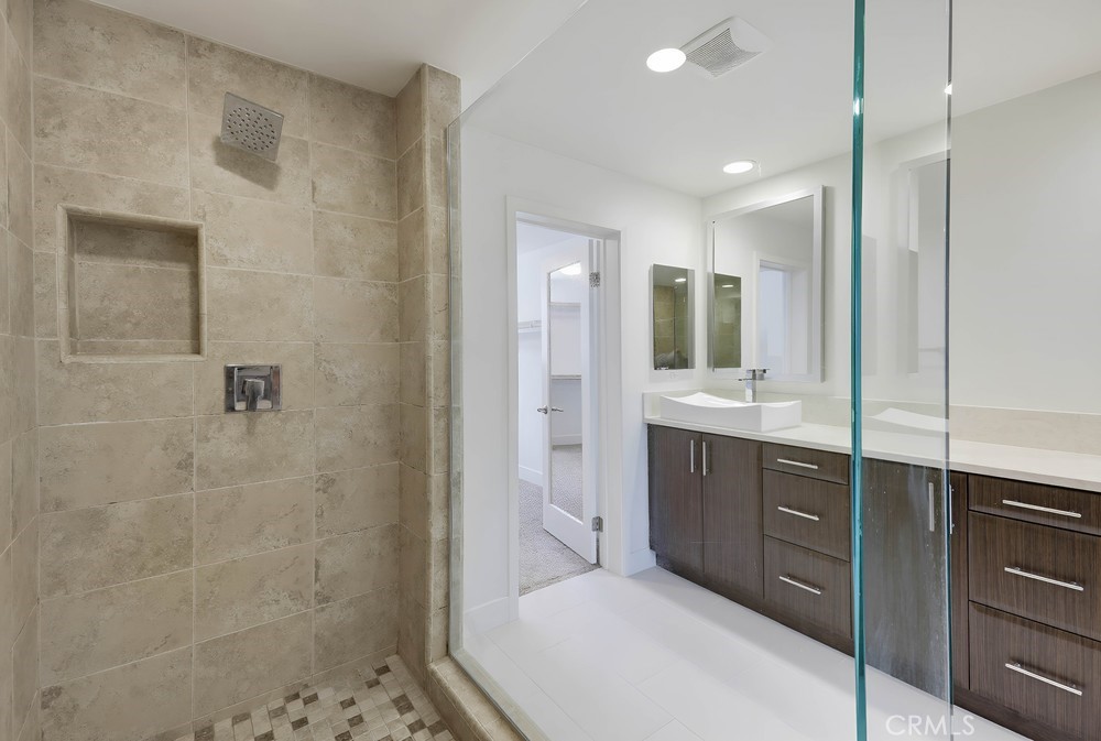 75 Lennox Irvine, CA 92612 - Photo 35 of 73 a bathroom with a sink a toilet and shower